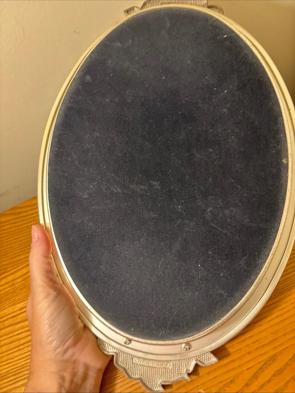 Elegant Silver Oval Wall Mirror with Rose Accents